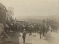 Photograph of wounded Frank Almy being placed in horsedrawn ambulance.